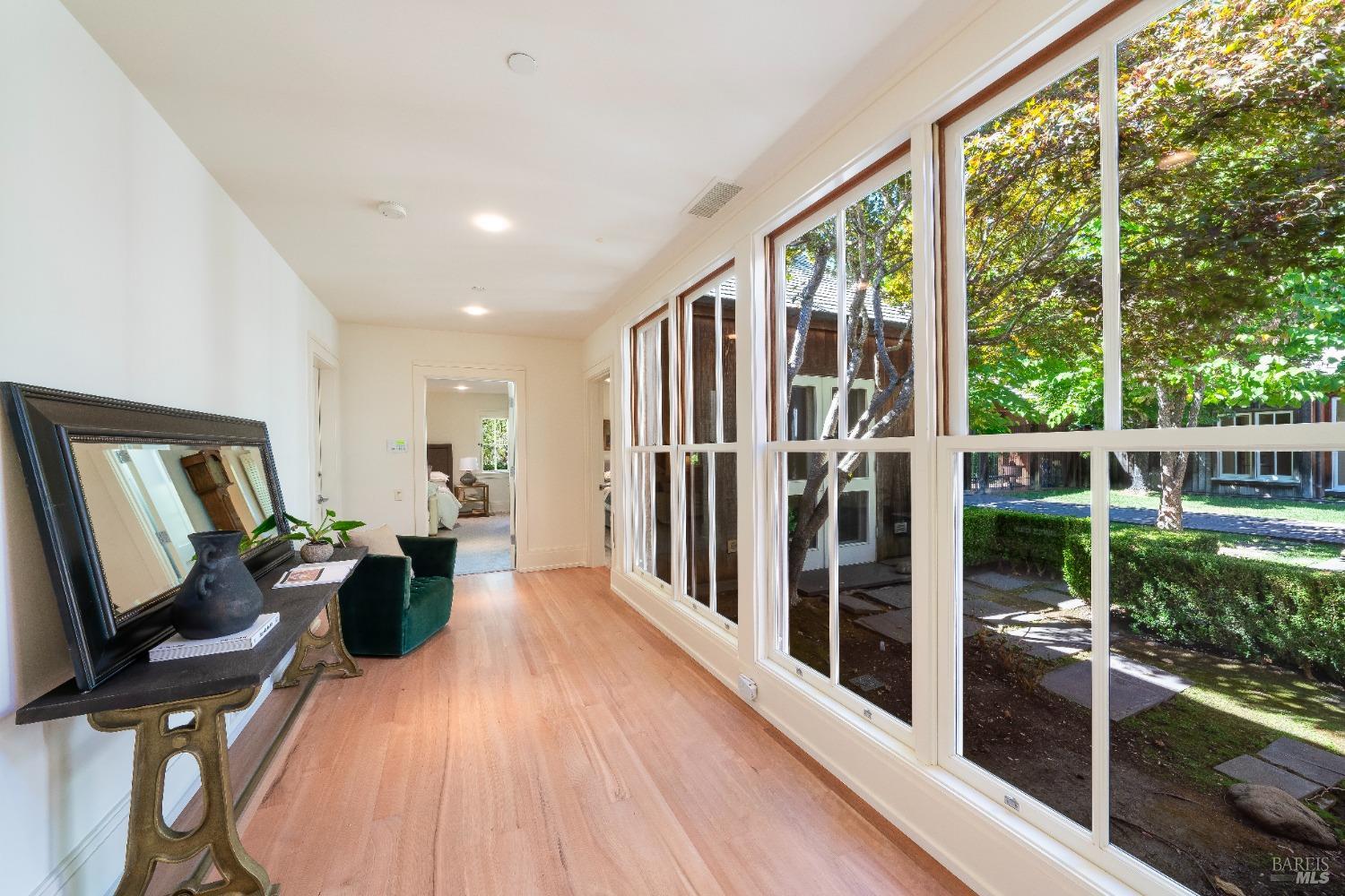 775 White Oak Drive Santa Rosa, CA 95409 - Photo 30 of 62 a view of a living room hardwood floor and a large window
