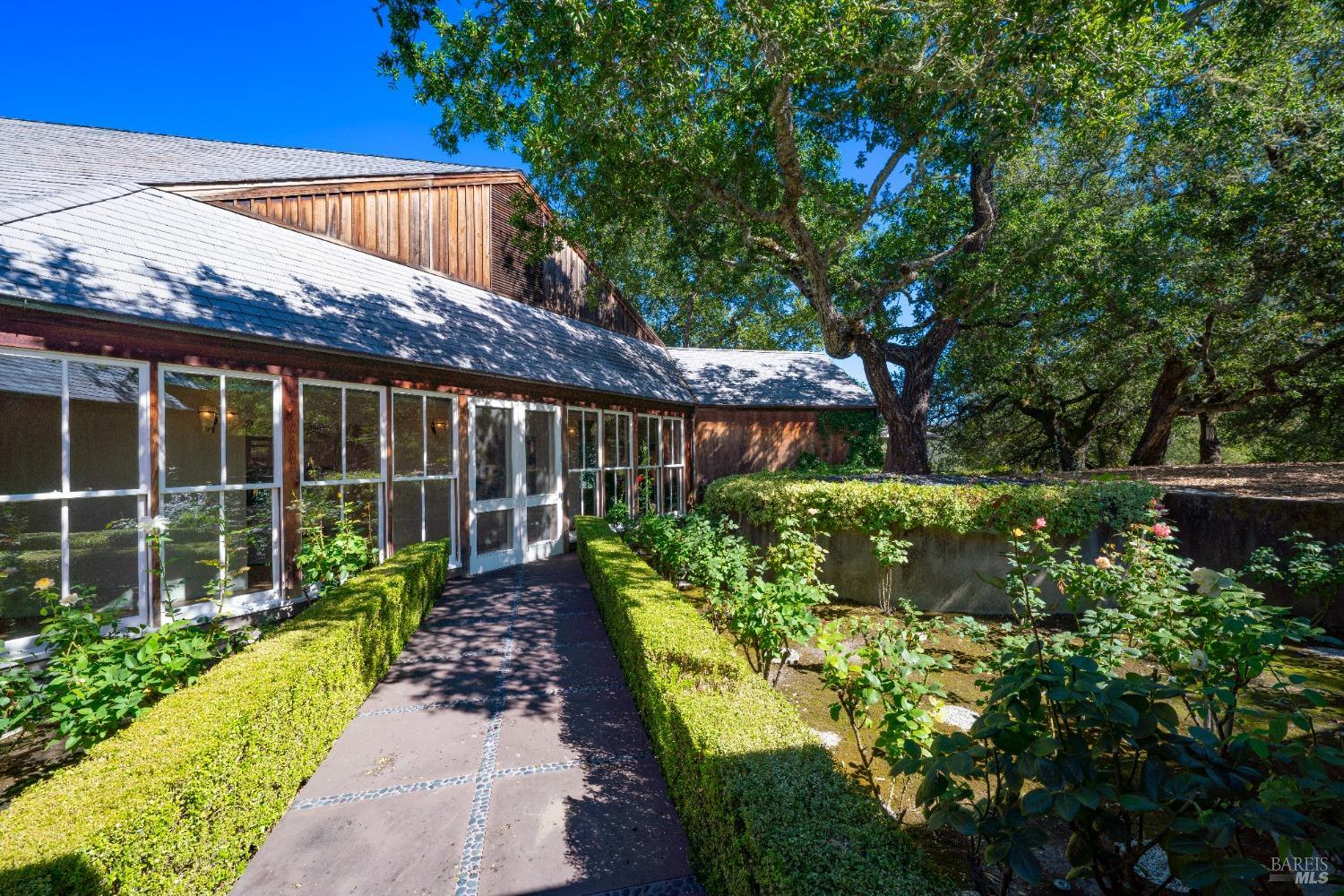 775 White Oak Drive Santa Rosa, CA 95409 - Photo 40 of 62 a view of house with garden and tall trees