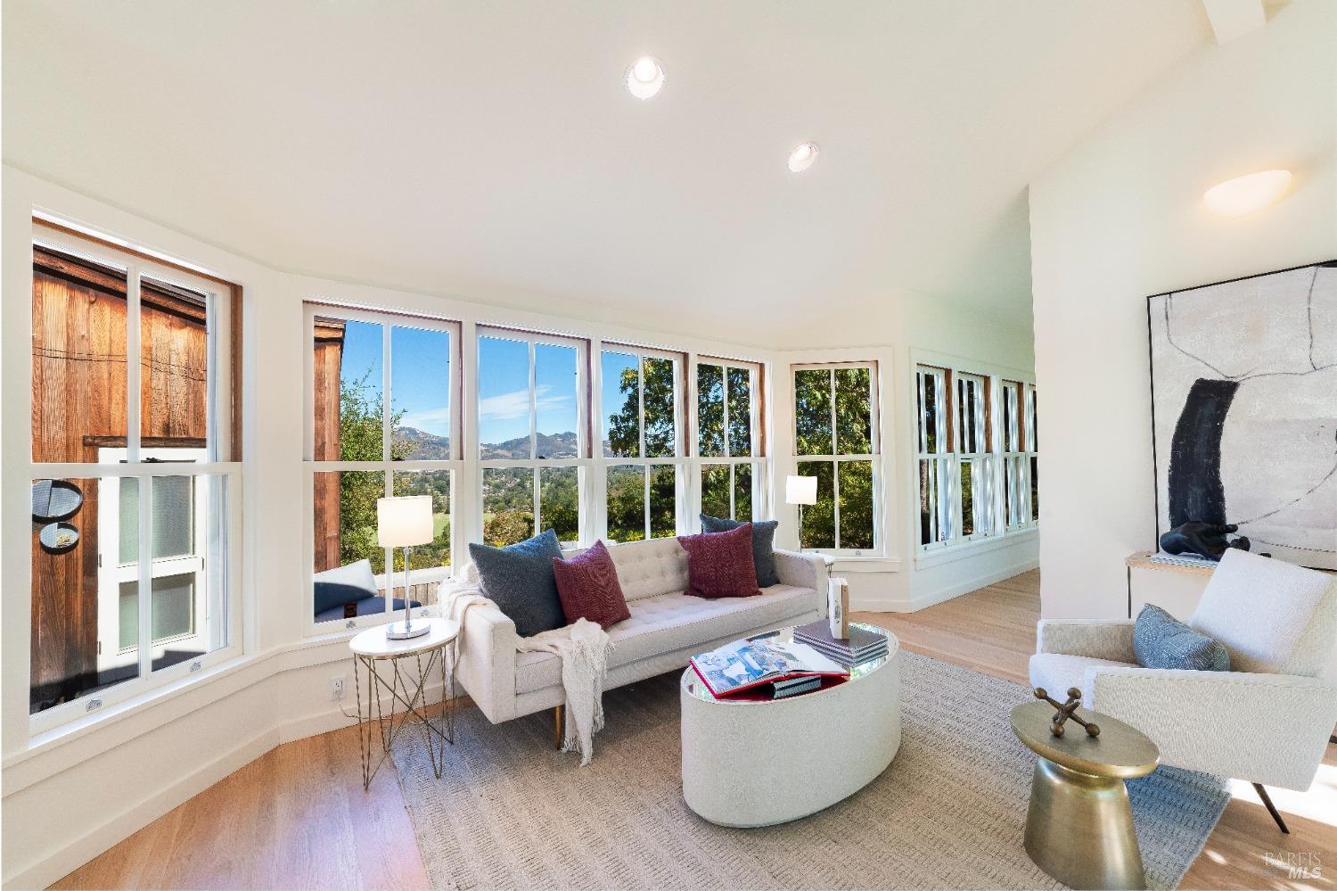 775 White Oak Drive Santa Rosa, CA 95409 - Photo 45 of 62 a living room with furniture large window and wooden floor
