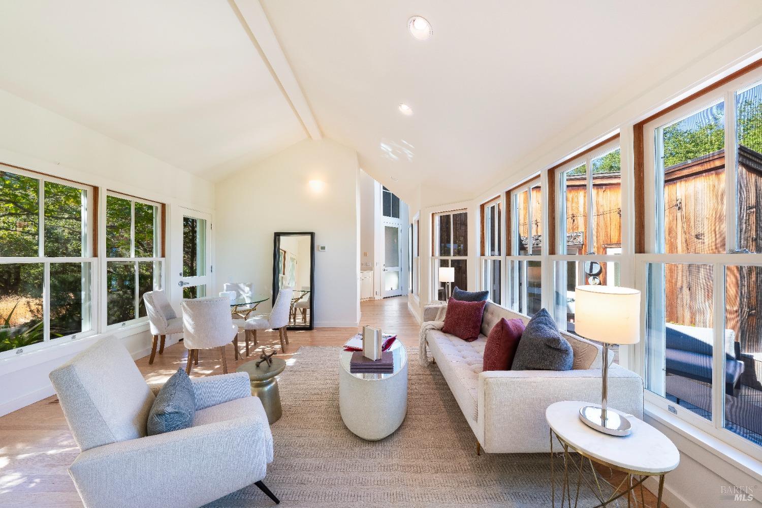 775 White Oak Drive Santa Rosa, CA 95409 - Photo 46 of 62 a living room with furniture and floor to ceiling windows