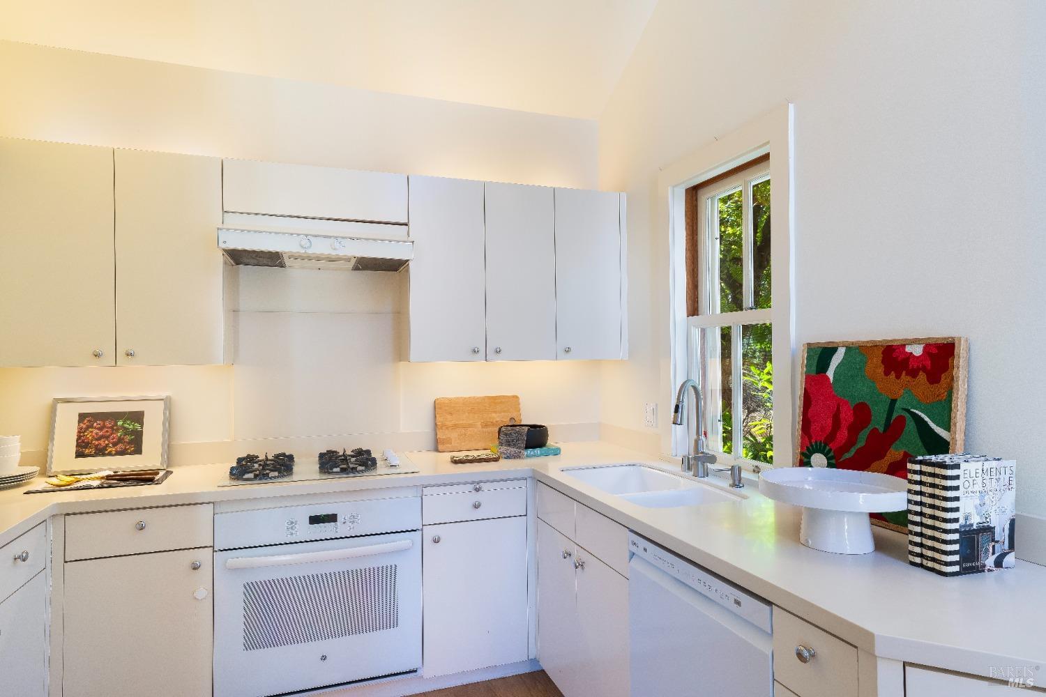 775 White Oak Drive Santa Rosa, CA 95409 - Photo 48 of 62 a kitchen with a sink cabinets and window