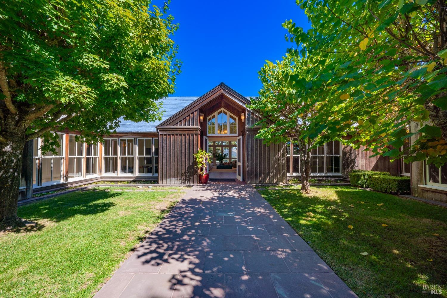 775 White Oak Drive Santa Rosa, CA 95409 - Photo 58 of 62 a front view of a house with a garden and trees