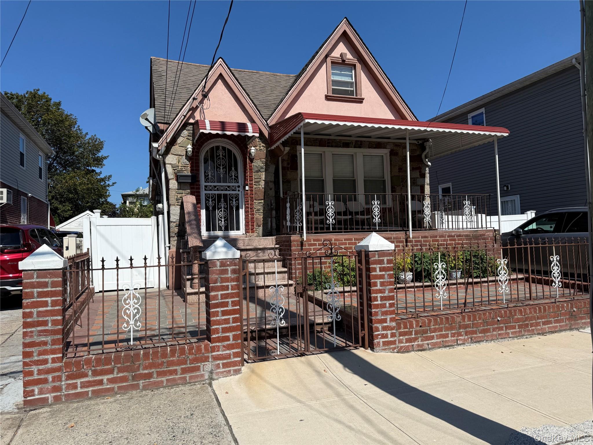 a front view of a house with glass doors