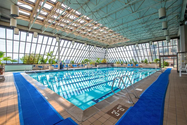 a view of swimming pool with a patio