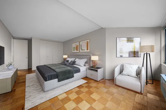 a bedroom with furniture and a couch