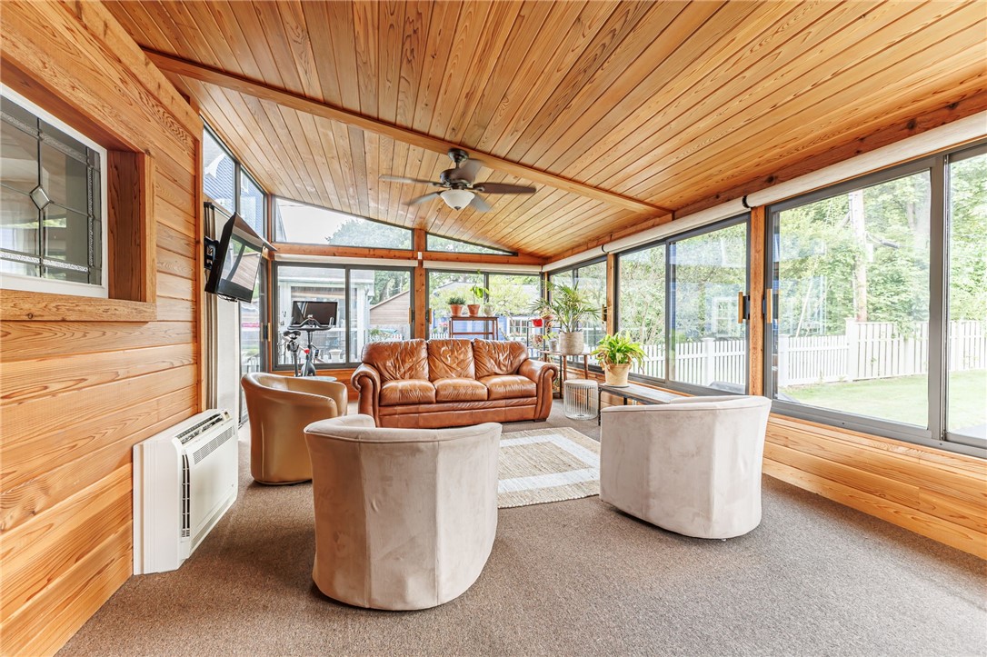 55 Elm Drive Rochester, NY 14609 - Photo 13 of 31 Relax in the four season Sun Room with vaulted wood ceiling