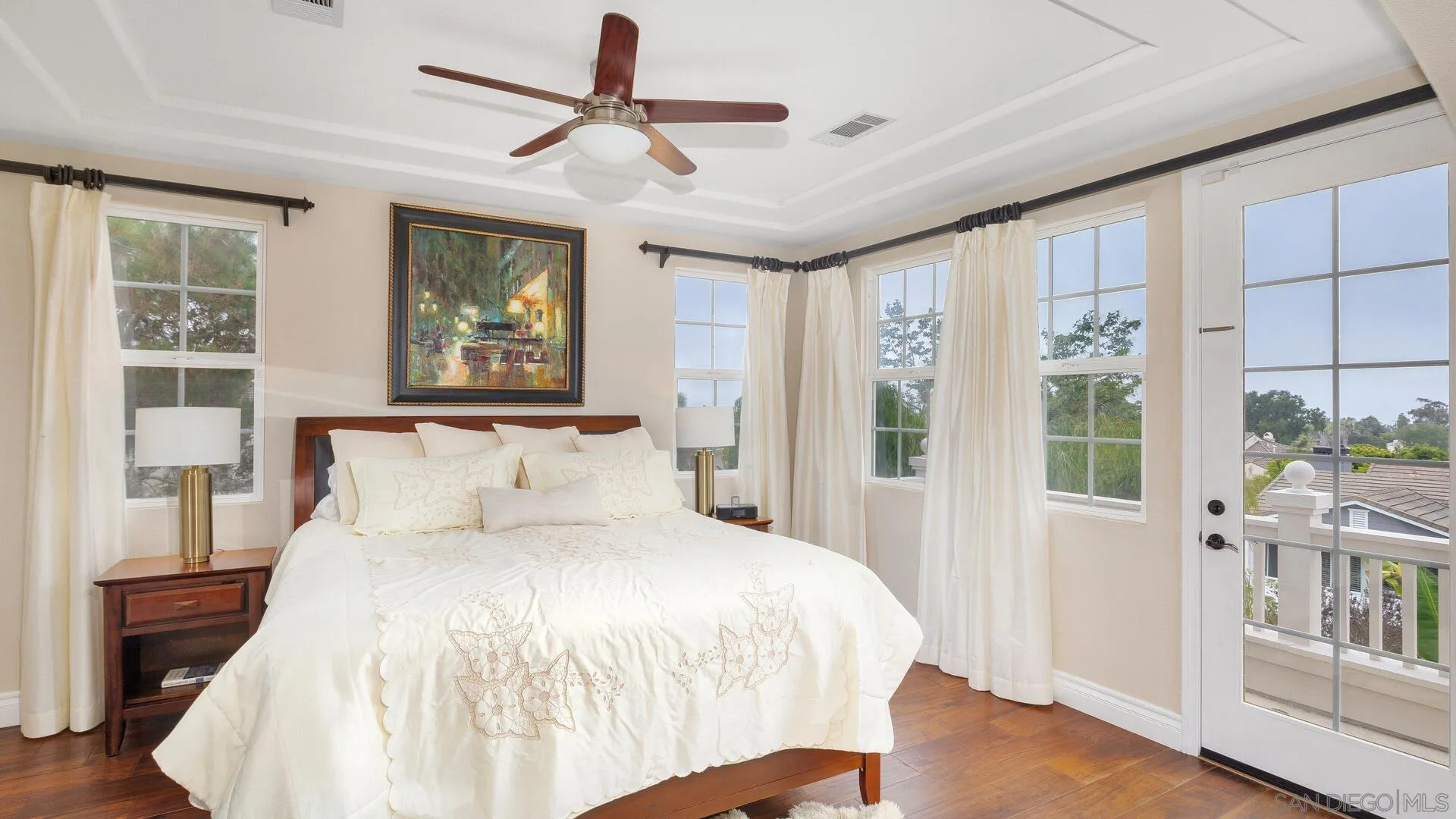 694 Rihely Place Encinitas, CA 92024 - Photo 13 of 31 a bedroom with a large bed and a window