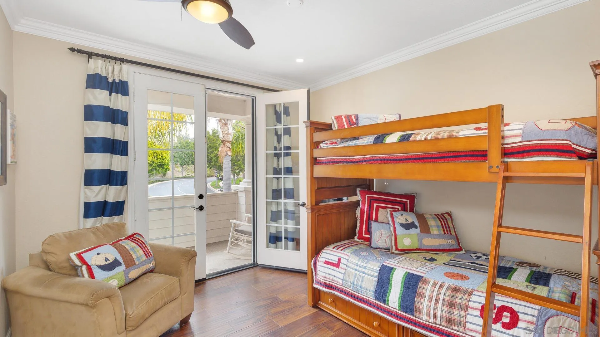 694 Rihely Place Encinitas, CA 92024 - Photo 19 of 31 a bedroom with furniture and a large window