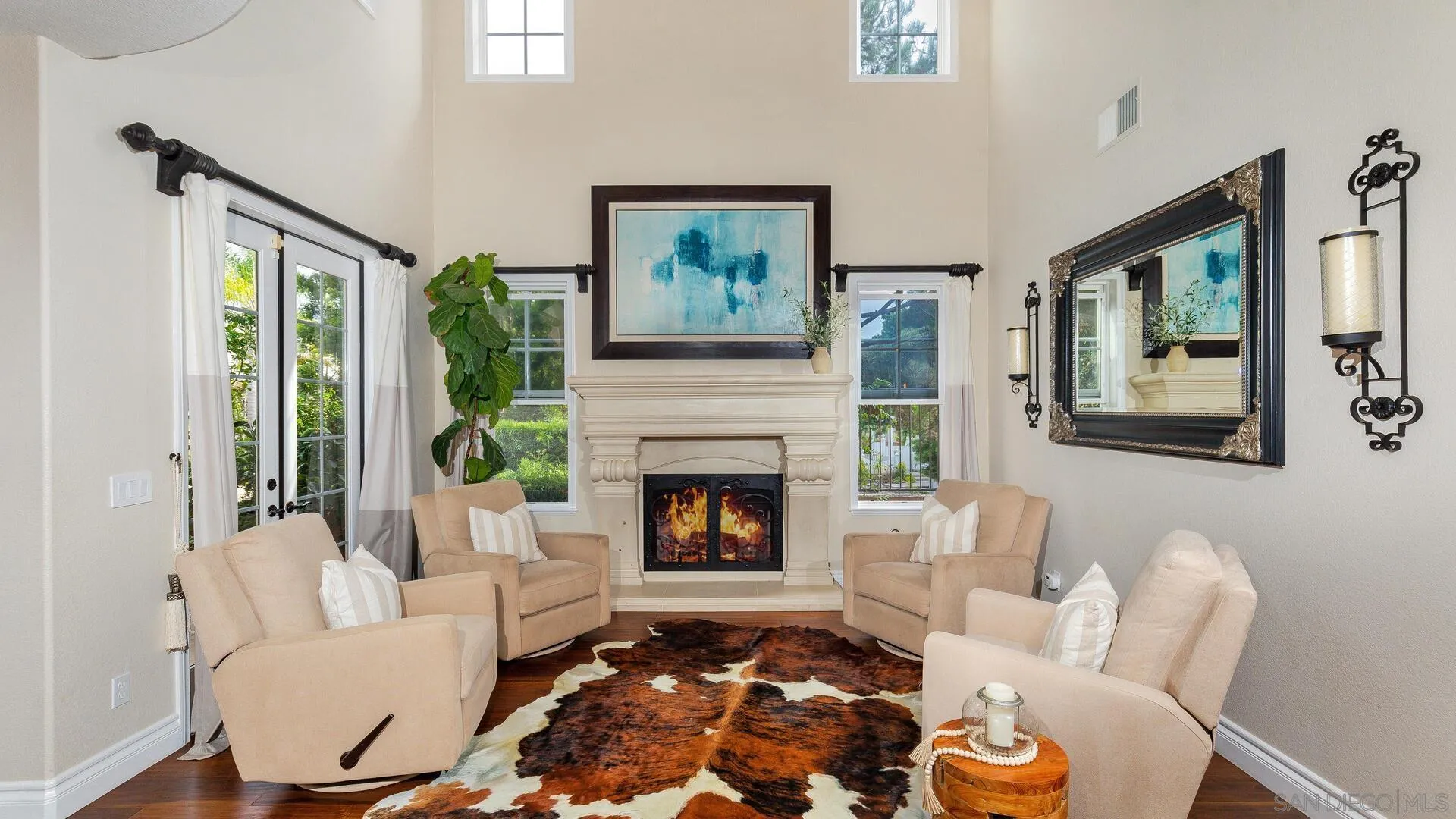 694 Rihely Place Encinitas, CA 92024 - Photo 2 of 31 a living room with furniture and a fireplace