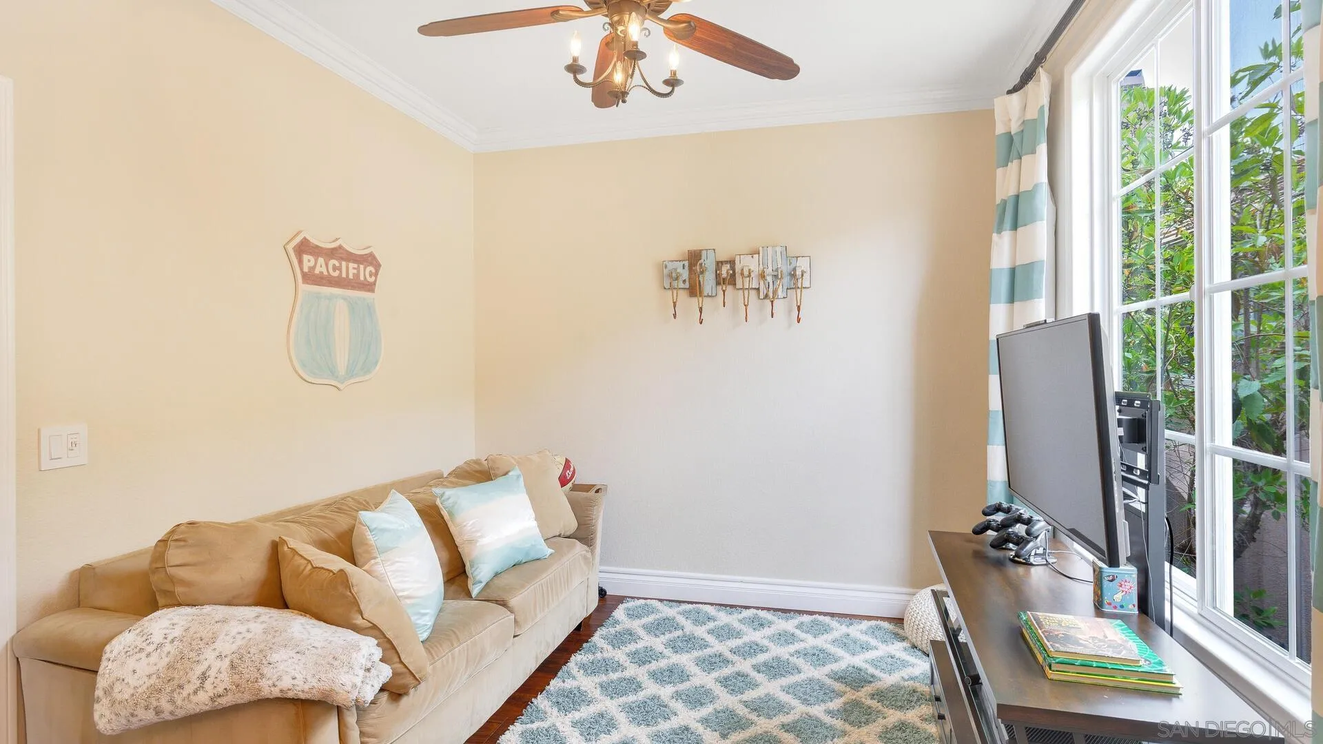 694 Rihely Place Encinitas, CA 92024 - Photo 21 of 31 a living room with furniture and a window