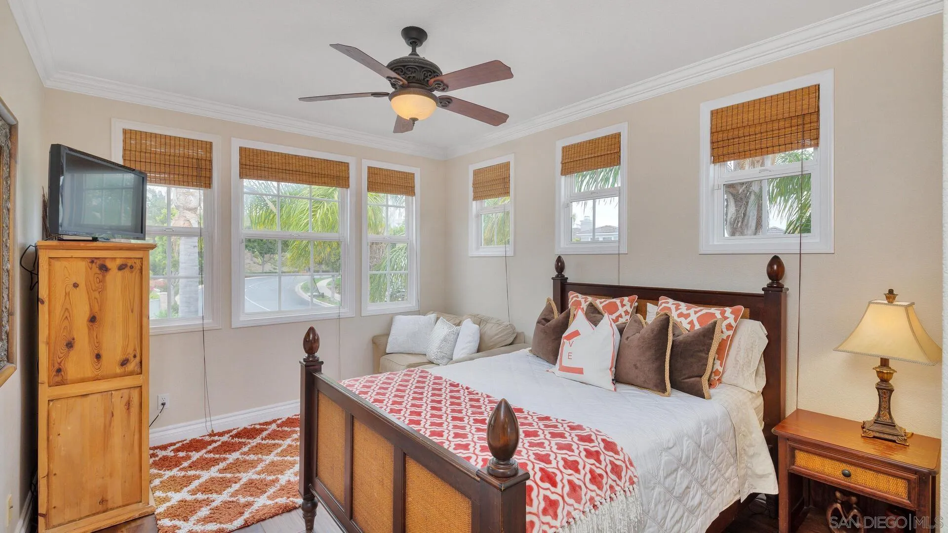 694 Rihely Place Encinitas, CA 92024 - Photo 23 of 31 a bedroom with a bed and wooden floor