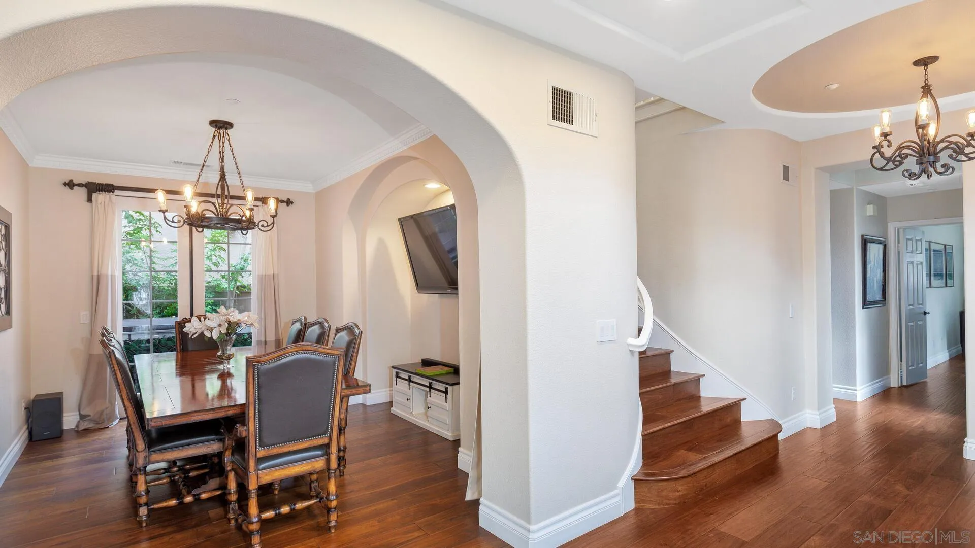 694 Rihely Place Encinitas, CA 92024 - Photo 3 of 31 a view of a dining room with furniture window and wooden floor