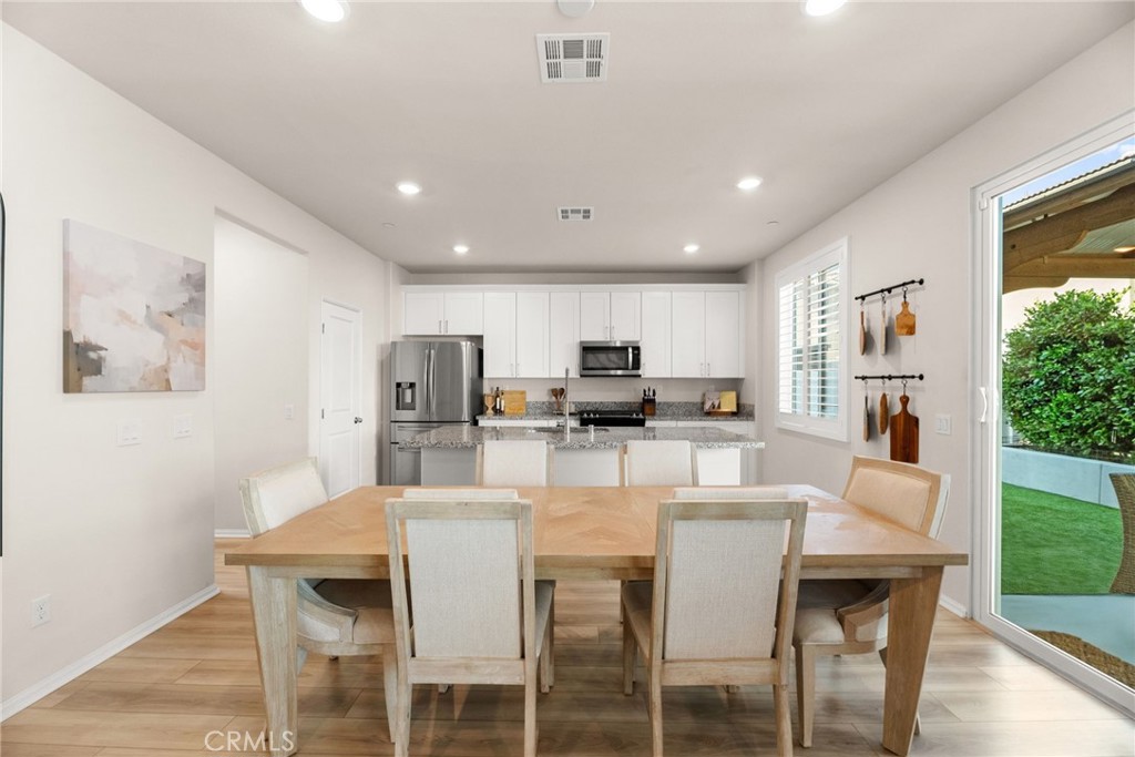 36362 Arcs Street Winchester, CA 92596 - Photo 21 of 54 a view of a dining room with furniture