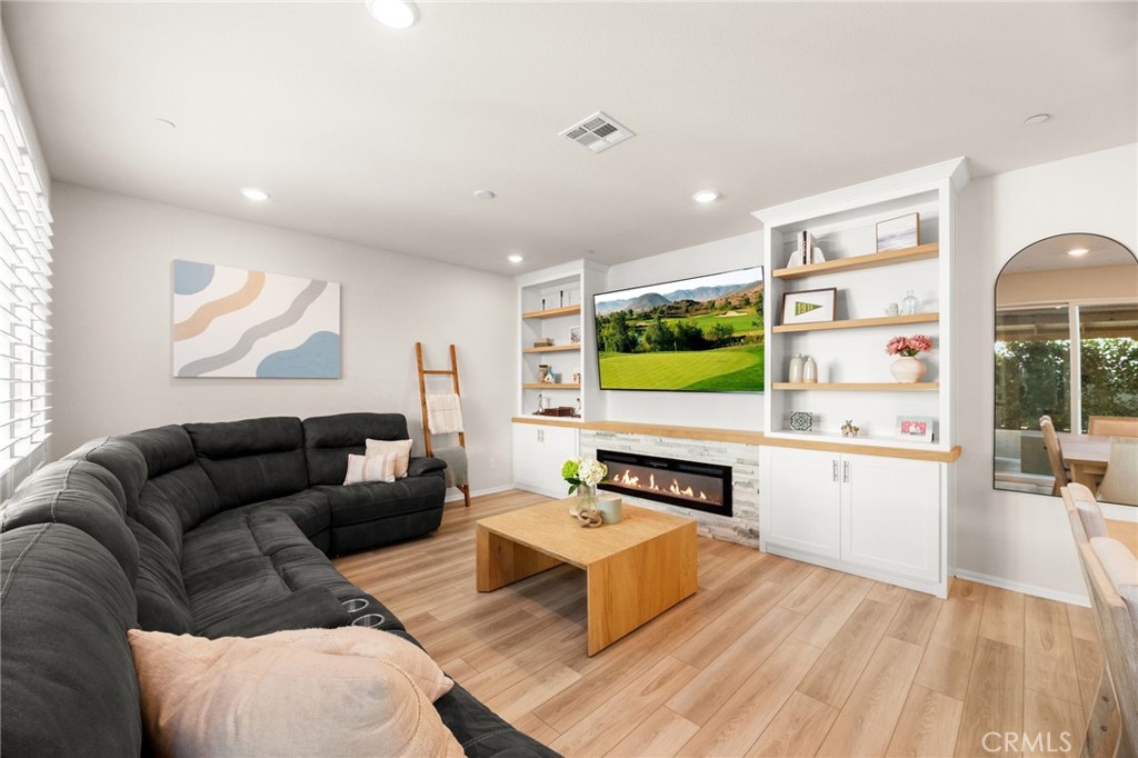 36362 Arcs Street Winchester, CA 92596 - Photo 23 of 54 a living room with furniture and a flat screen tv