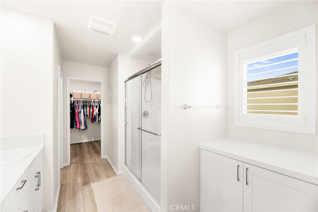 36362 Arcs Street Winchester, CA 92596 - Photo 41 of 54 a view of hallway with wooden floor