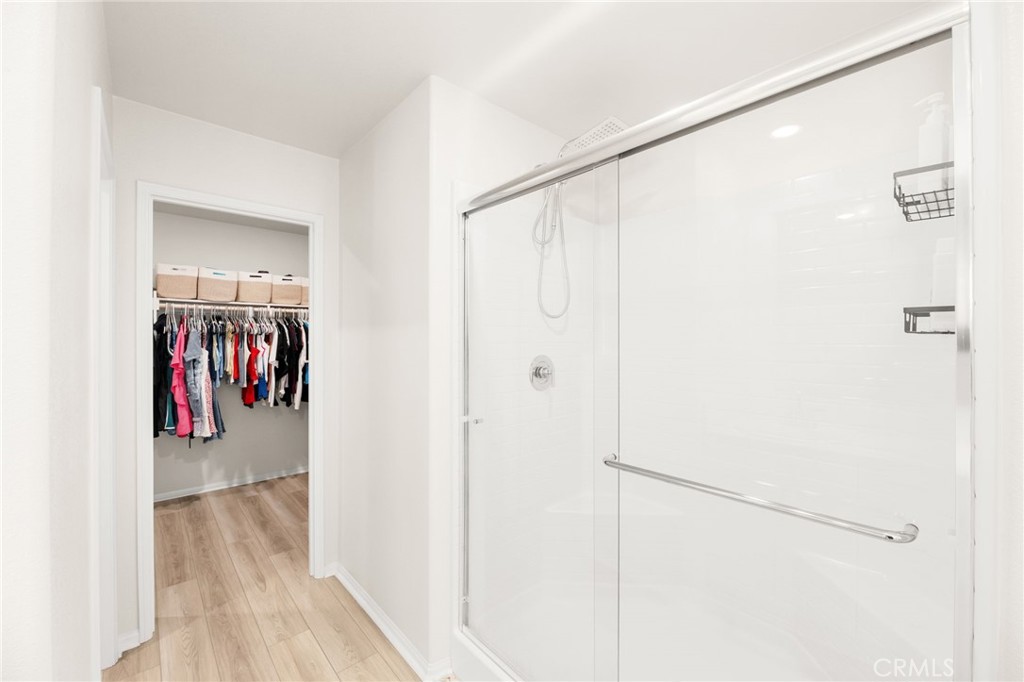 36362 Arcs Street Winchester, CA 92596 - Photo 44 of 54 a view of a hallway with walk in closet