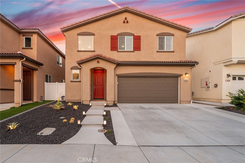 36362 Arcs Street Winchester, CA 92596 - Photo 10 of 54 a front view of a house with yard