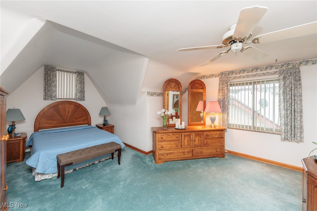 6192 Stanbury Road Parma, OH 44129 - Photo 35 of 49 Bedroom with ceiling fan, carpet flooring, and vaulted ceiling