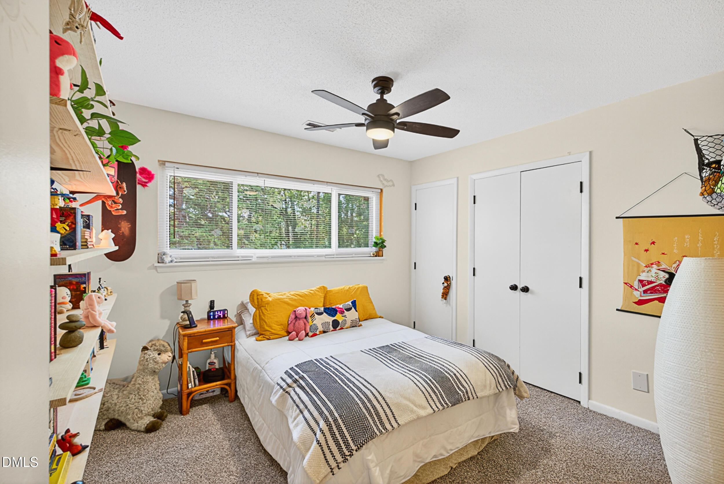 5080 Flint Ridge Place Raleigh, NC 27609 - Photo 16 of 24 a bedroom with a bed and a window