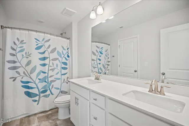 $374,900 | 90 Rigsby Avenue, Four Oaks, NC 27524