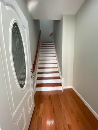 a view of entryway with washer and dryer