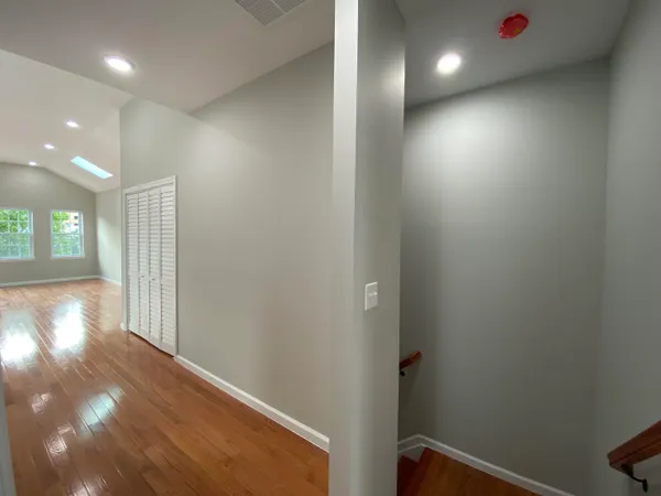 a view of entryway with wooden floor