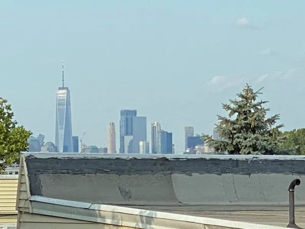 a view of a city with tall buildings