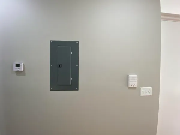 a front view of a house with a garage