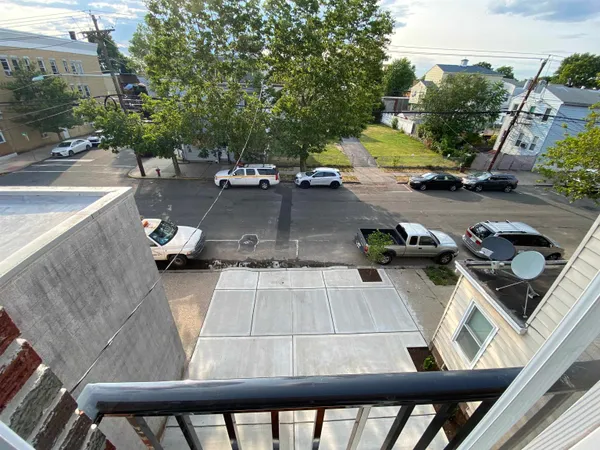 a view of yard from a balcony