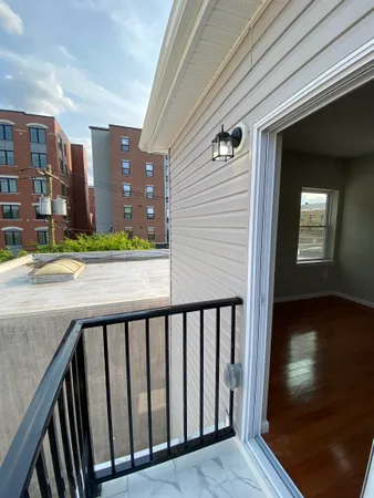 a view of a porch with a bench