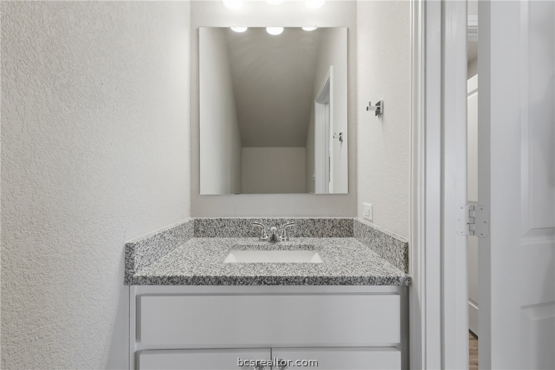 1922 Viva Road Bryan, TX 77807 - Photo 22 of 45 Convenient downstairs half bath showcases upgraded painted cabinetry.