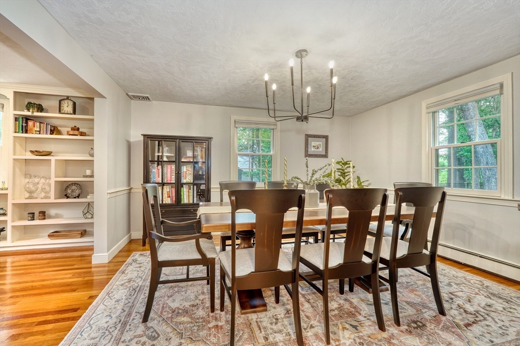 162 Border Road Concord, MA 01742 - Photo 15 of 39 a view of a dining room with furniture window and wooden floor