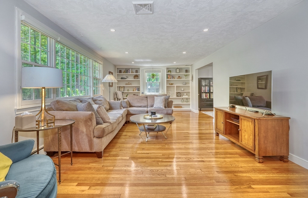 162 Border Road Concord, MA 01742 - Photo 20 of 39 a living room with furniture and a wooden floor