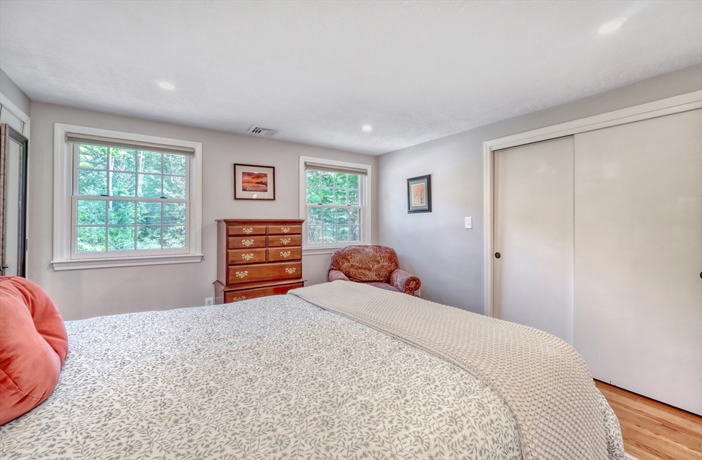 162 Border Road Concord, MA 01742 - Photo 24 of 39 a bedroom with a bed and a window