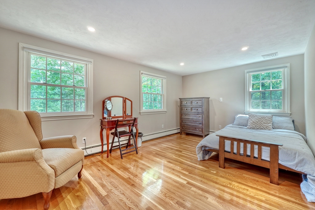 162 Border Road Concord, MA 01742 - Photo 25 of 39 a bedroom with furniture and a window