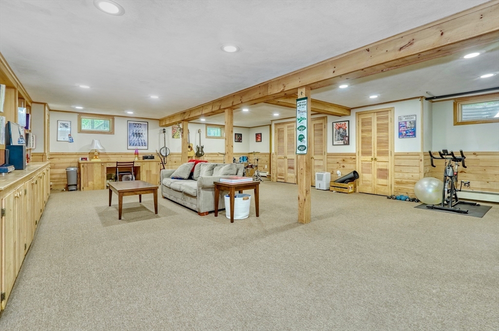 162 Border Road Concord, MA 01742 - Photo 28 of 39 a living room with furniture and a large window