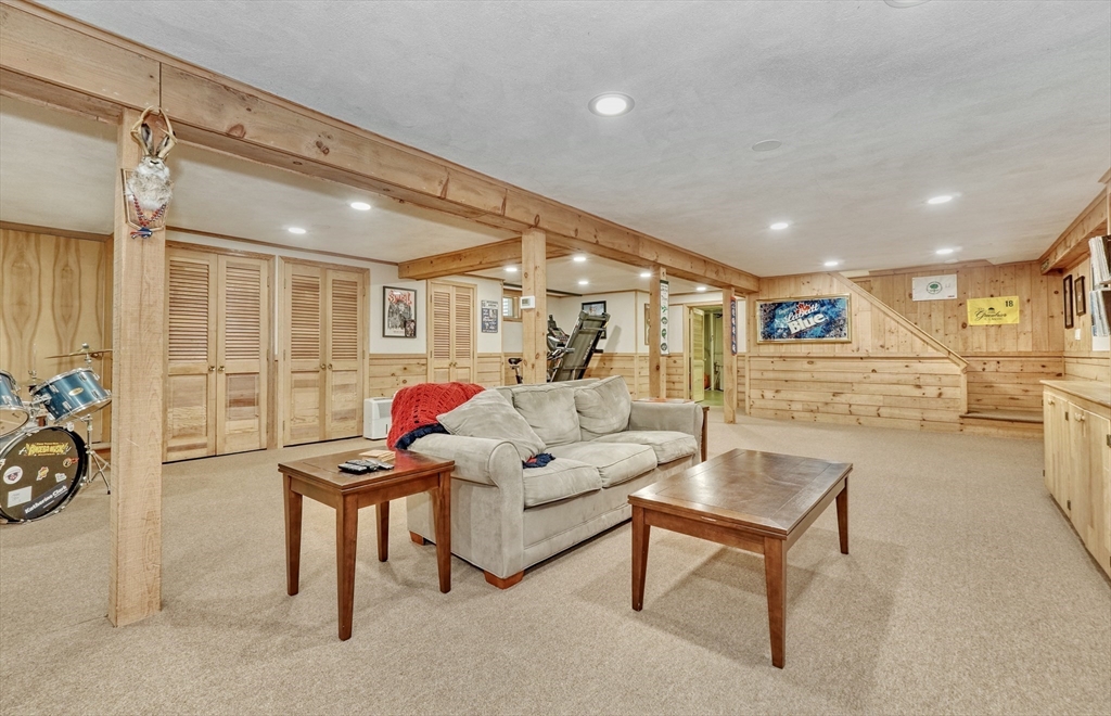162 Border Road Concord, MA 01742 - Photo 29 of 39 a living room with furniture and a table