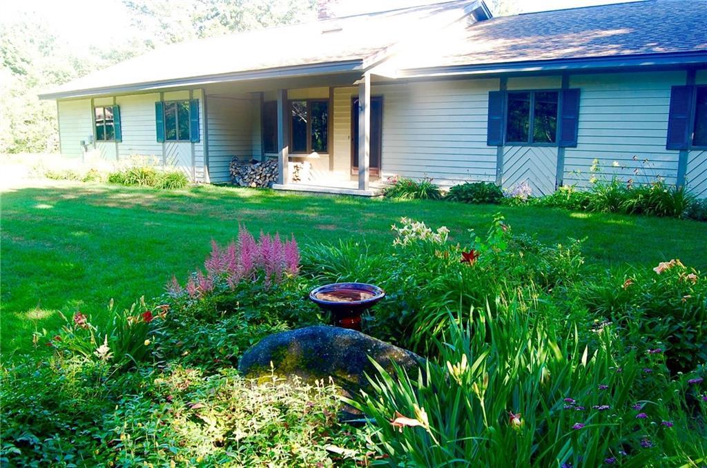 71 Stony Point Road Belgrade, ME 04917 - Photo 27 of 34 Established perennial beds line the...