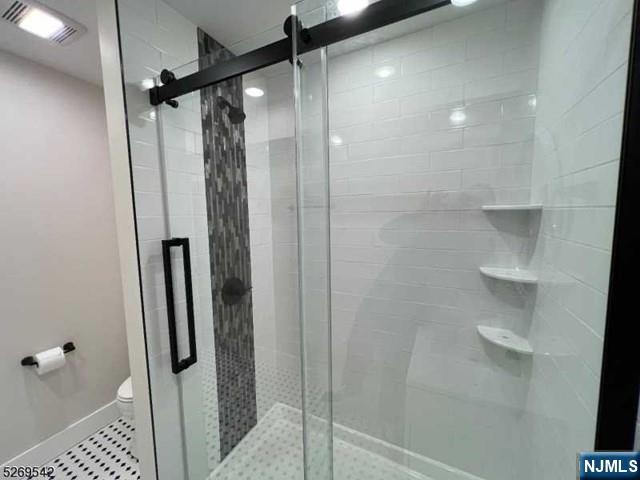 314 Cornelia Street Boonton, NJ 07005 - Photo 20 of 29 a bathroom with a shower and a glass door