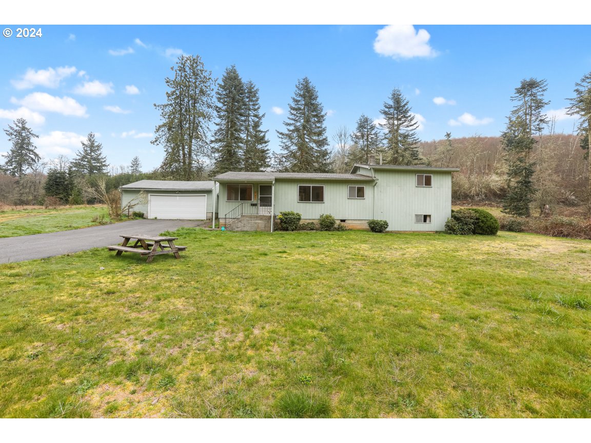 71962 Fern Hill Road Rainier, OR 97048 - Photo 7 of 43 a view of a house with a yard
