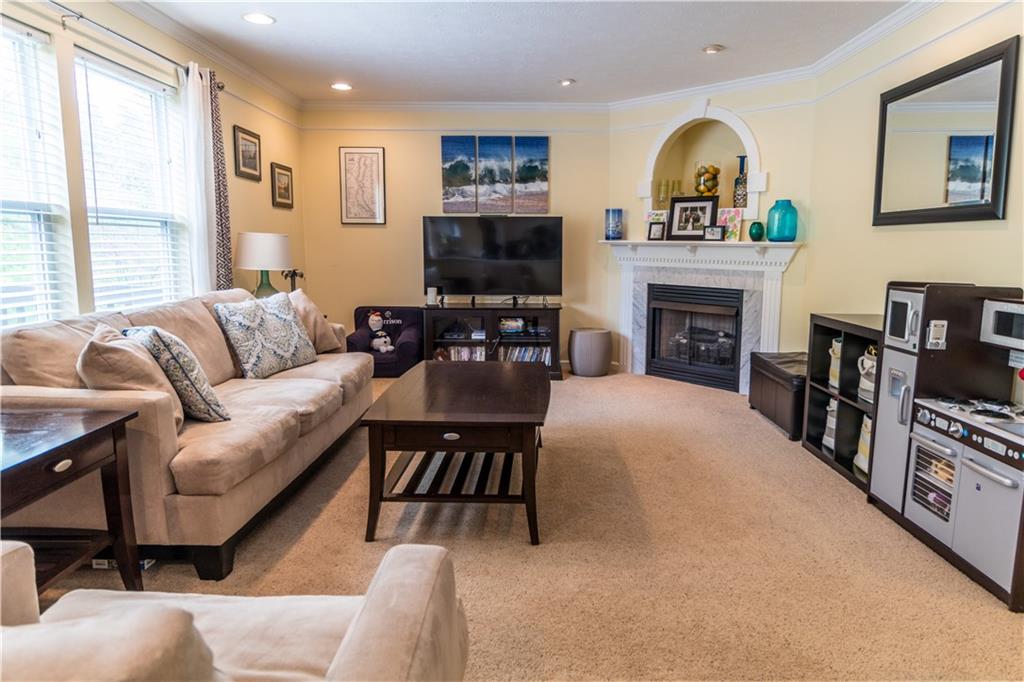 3004 Meyeridge Road Pittsburgh, PA 15209 - Photo 3 of 22 Family room which is open to kitchen featuring a gas fireplace and great natural light.