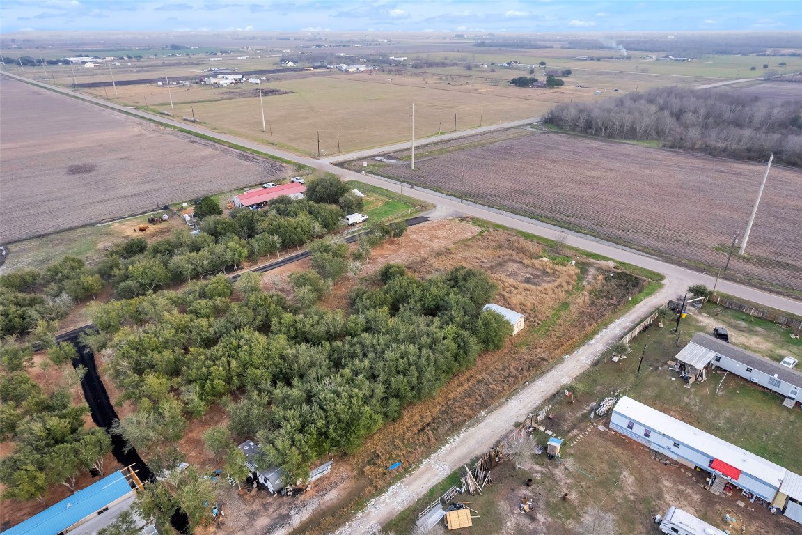 13404 Buls Road East Bernard, TX 77435 - Photo 13 of 14 a view of a lake with a terrace