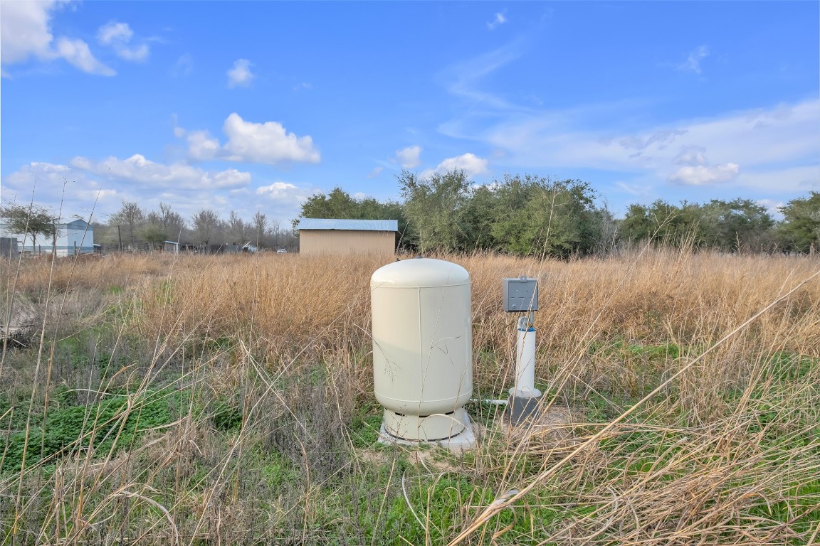 13404 Buls Road East Bernard, TX 77435 - Photo 2 of 14 a view of a lake from a yard