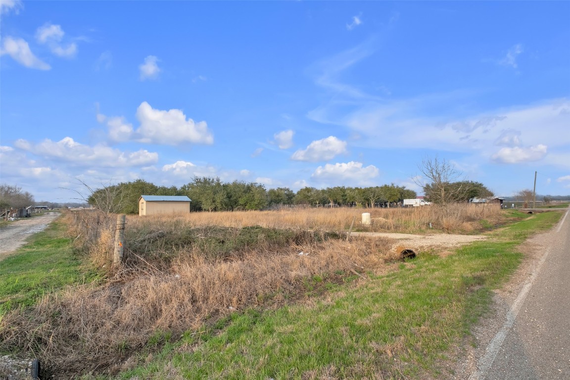 13404 Buls Road East Bernard, TX 77435 - Photo 5 of 14 a view of a lake with a yard