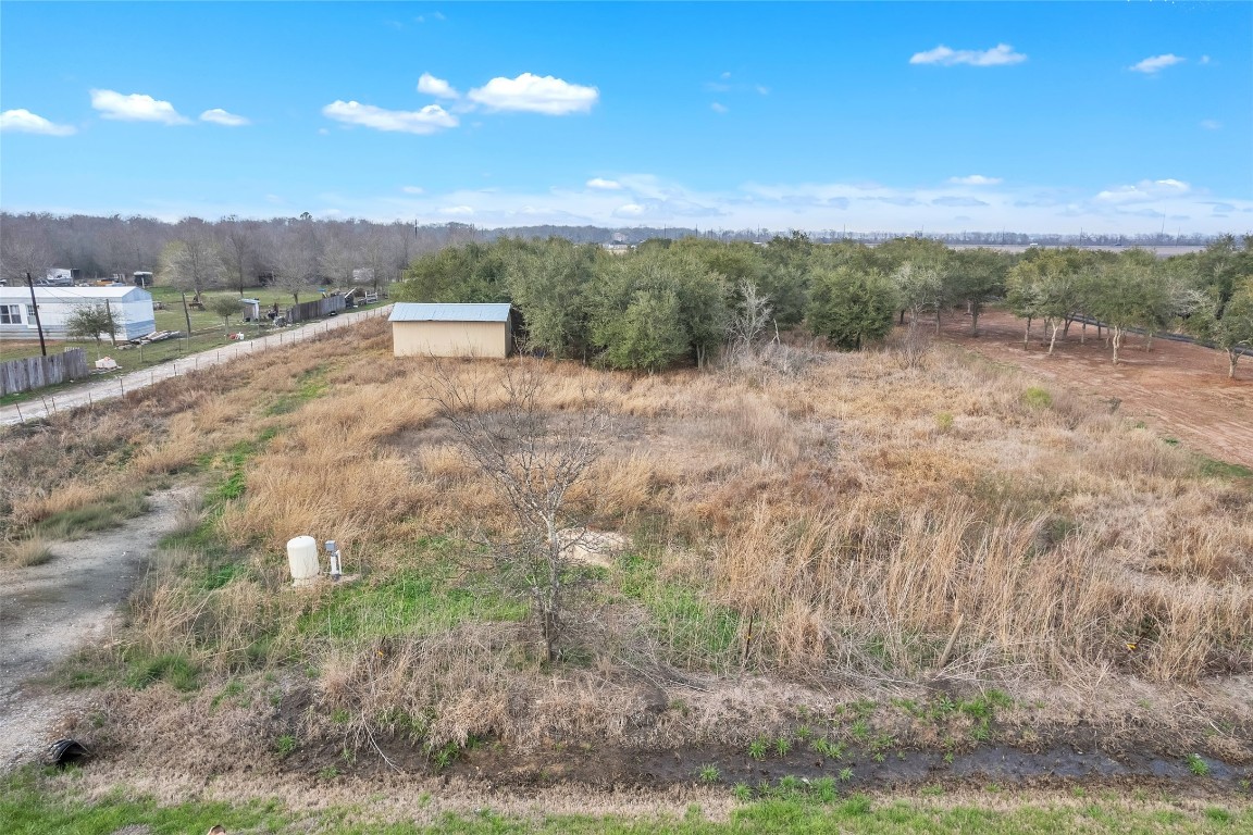 13404 Buls Road East Bernard, TX 77435 - Photo 7 of 14 a view of a dry yard with green space