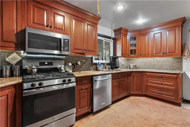 a bathroom with a tub and shower