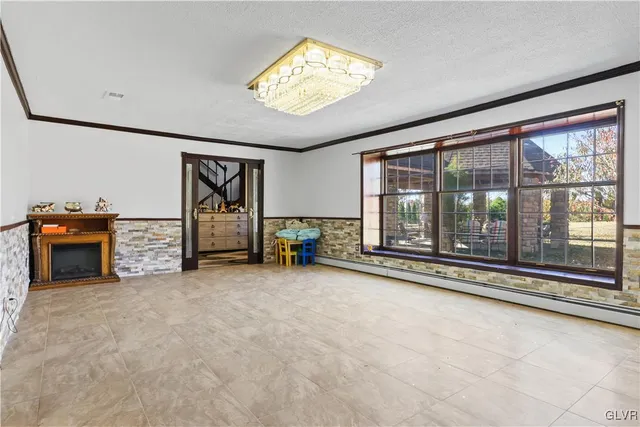 a bedroom with a bed and a night stand