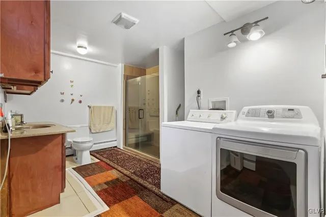 an aerial view of a house with swimming pool