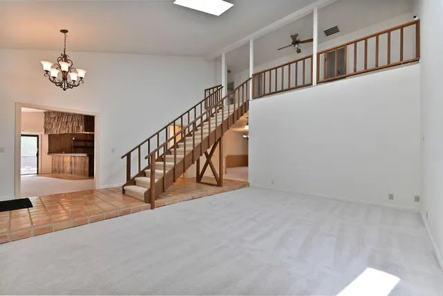 a view of fireplace and window