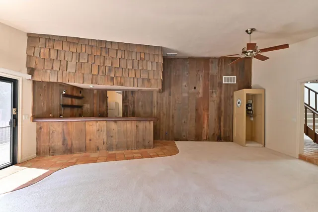 a bathroom with a tub a sink and a shower